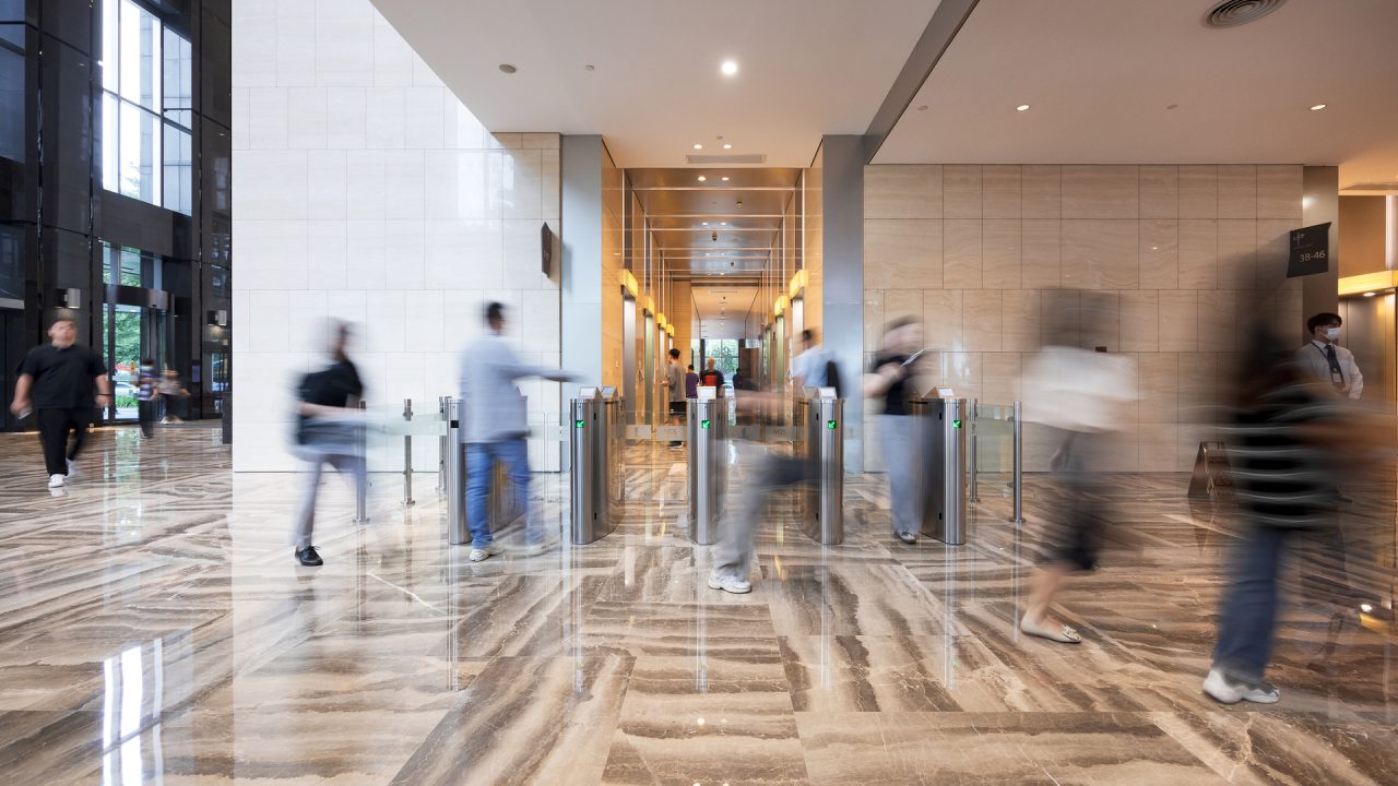 Schindler PORT turnstiles in an office lobby